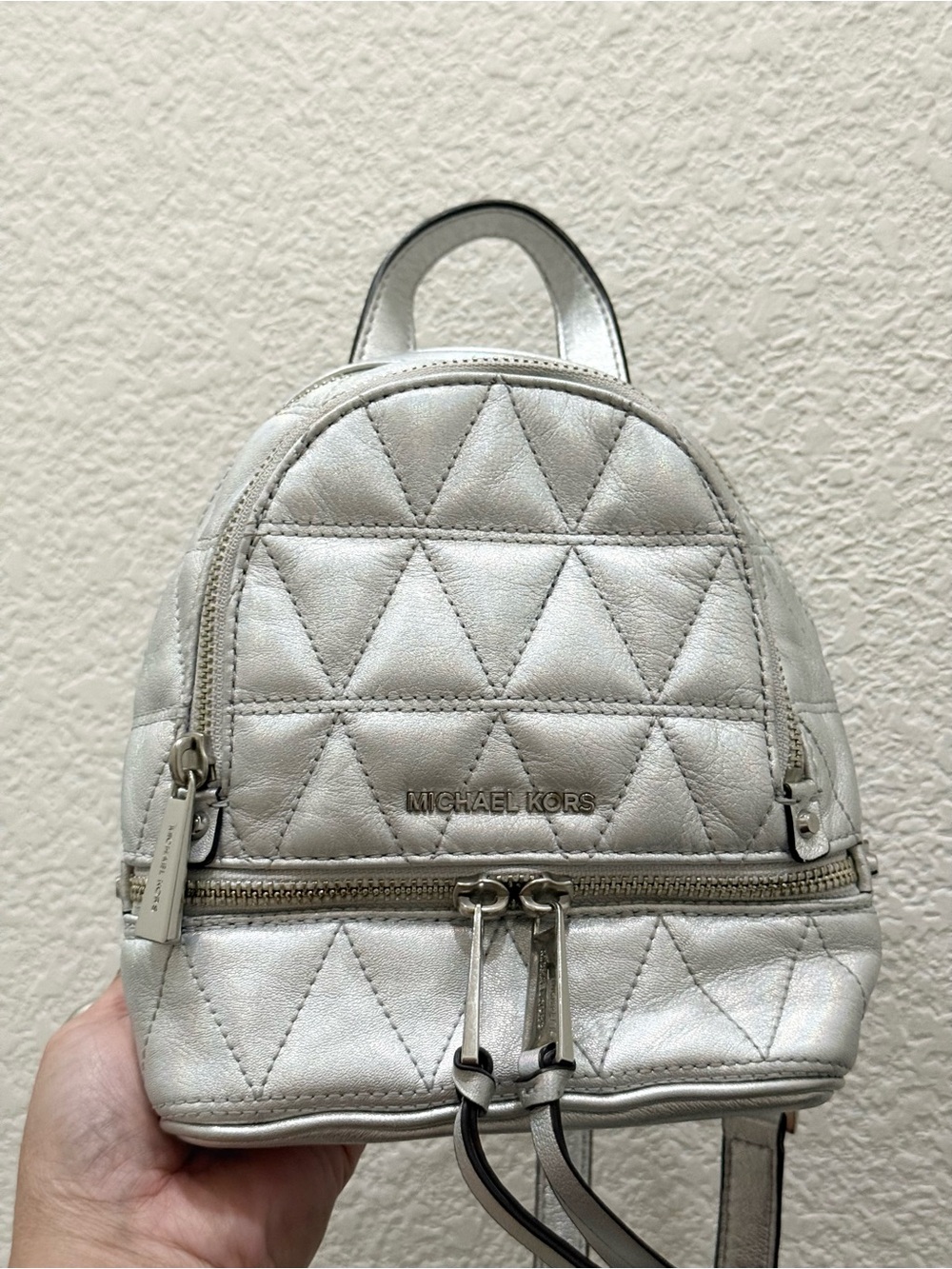 MICHAEL KORS Rhea Mini Silver Metallic Quilted Leather Mini Backpack
EUC - Picture 5 of 16